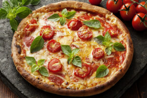 pizza italiana rústica con mozzarella, queso y hojas de albahaca